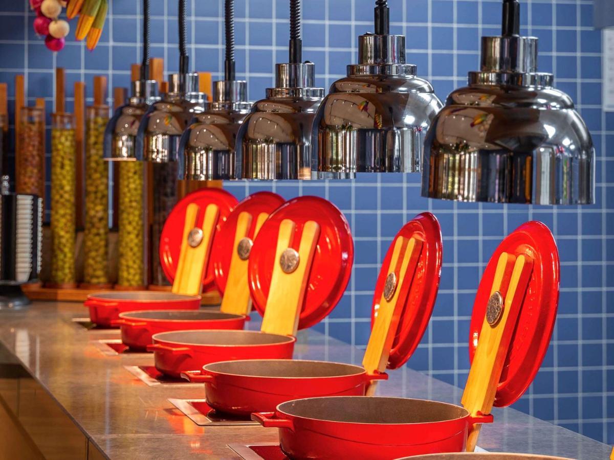 Mercure Trabzon Hotel Exterior photo A row of Le Creuset cast iron cookware