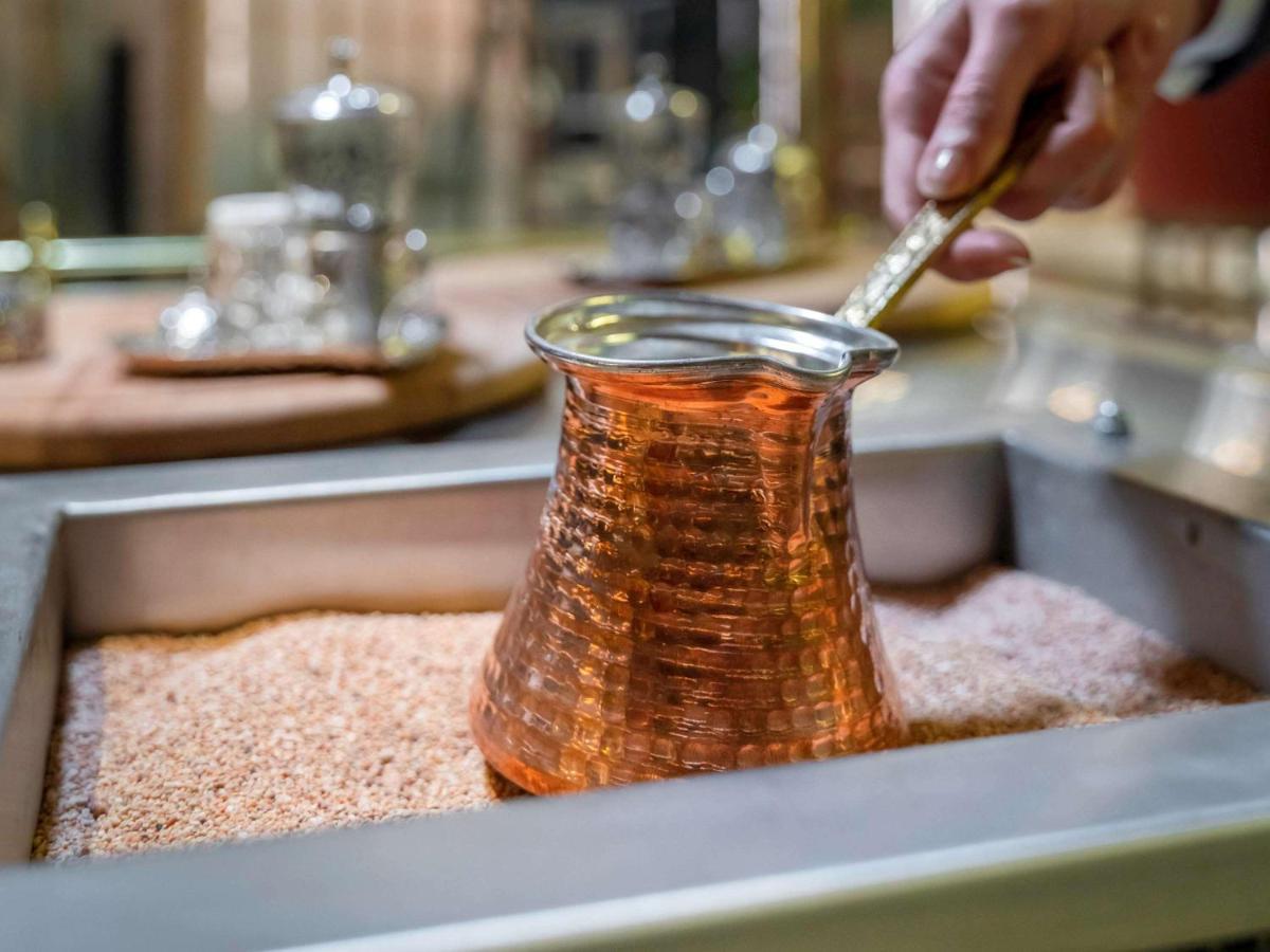 Mercure Trabzon Hotel Exterior photo Turkish coffee being prepared in a cezve